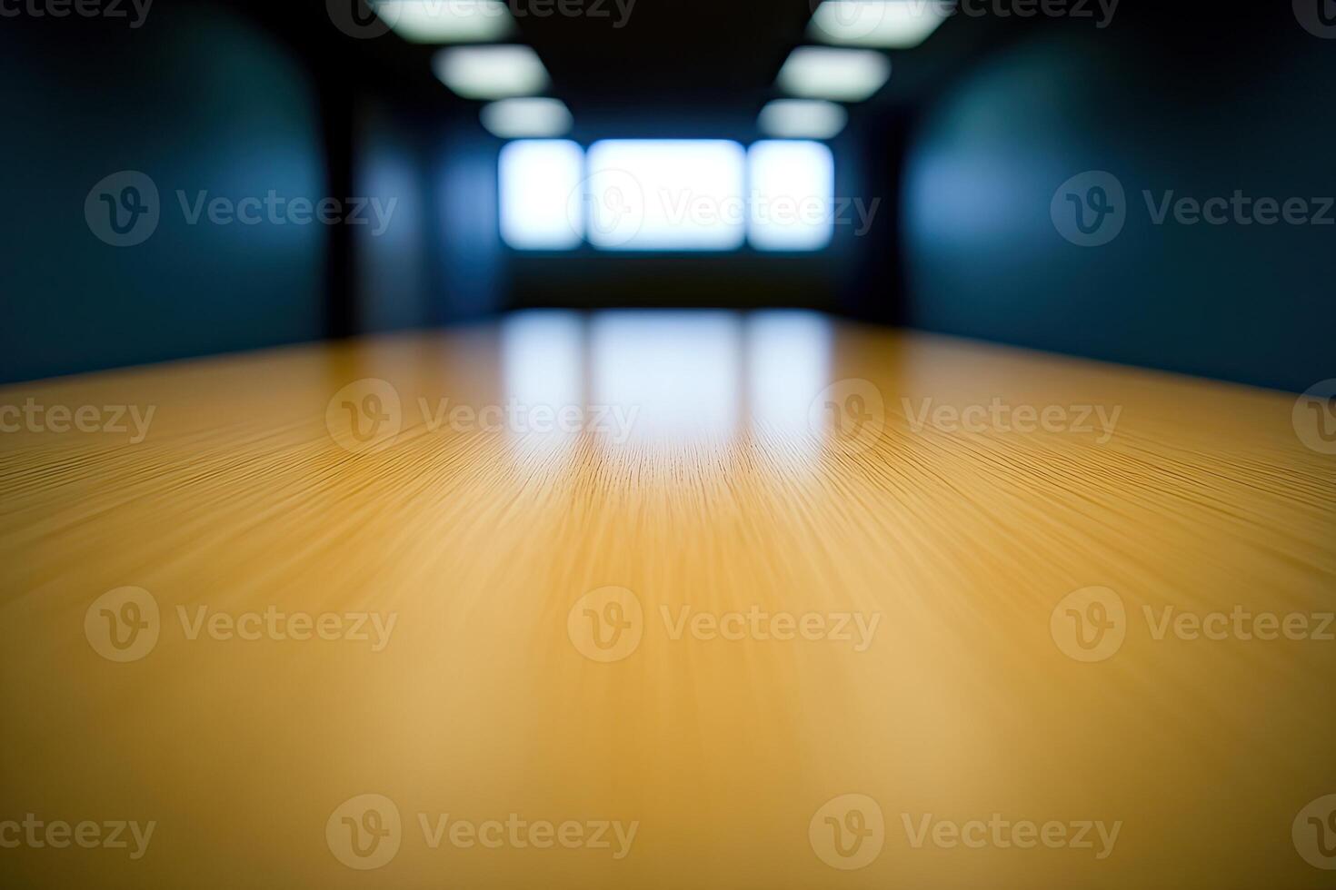 An empty conference table in a dark room photo