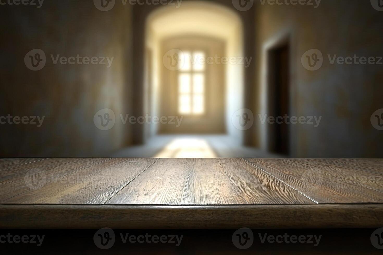 Empty wooden table in a dark room with light coming in photo