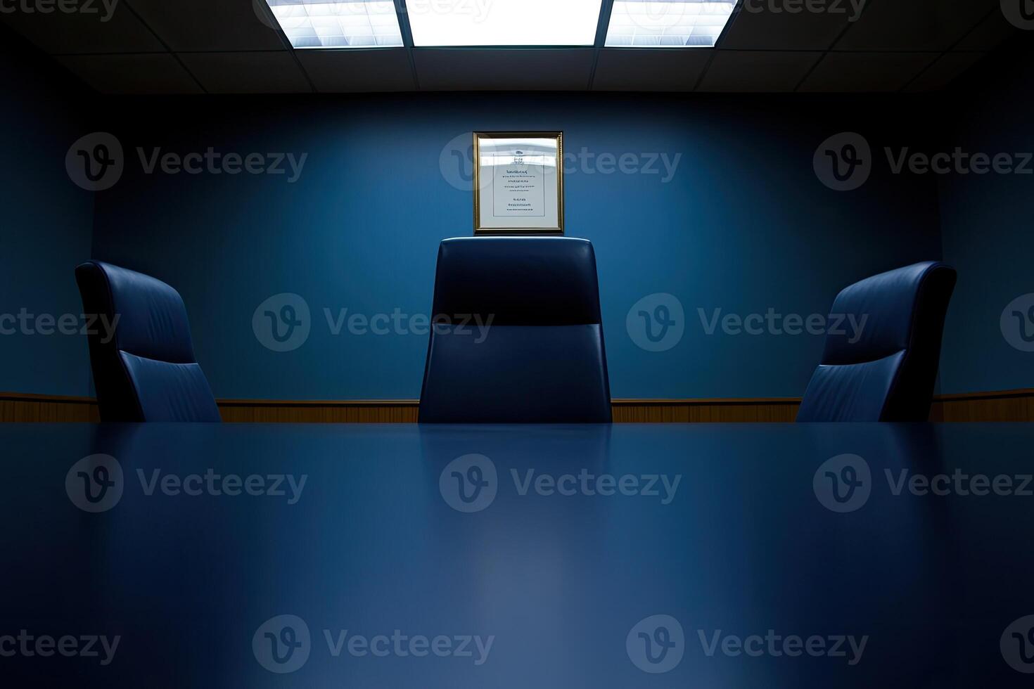 A conference room with two chairs and a table photo