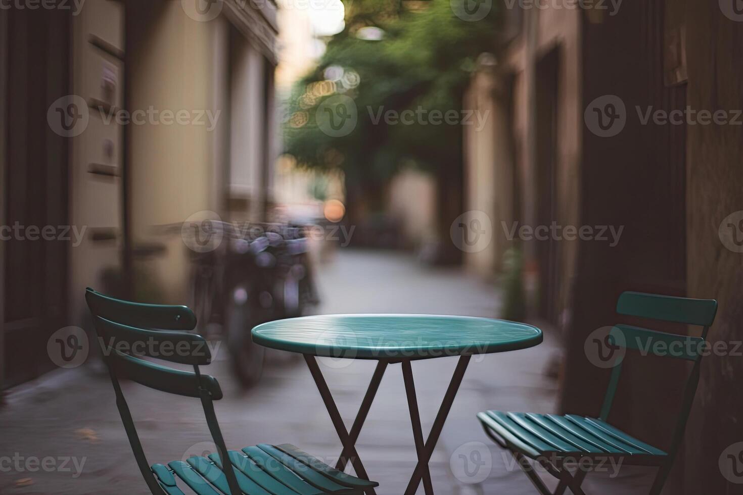 A table and two chairs on a street photo