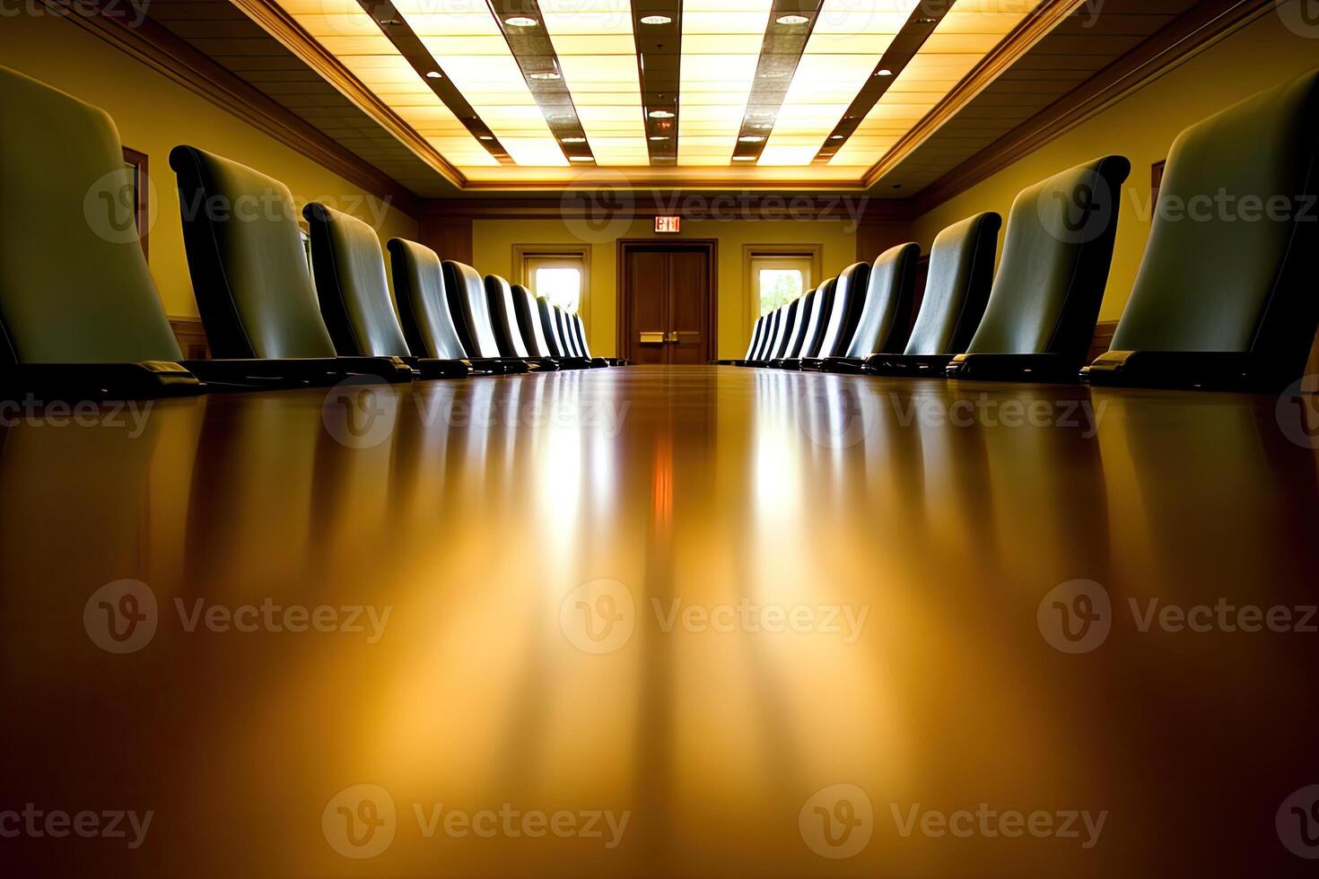 A long table with chairs in a conference room photo