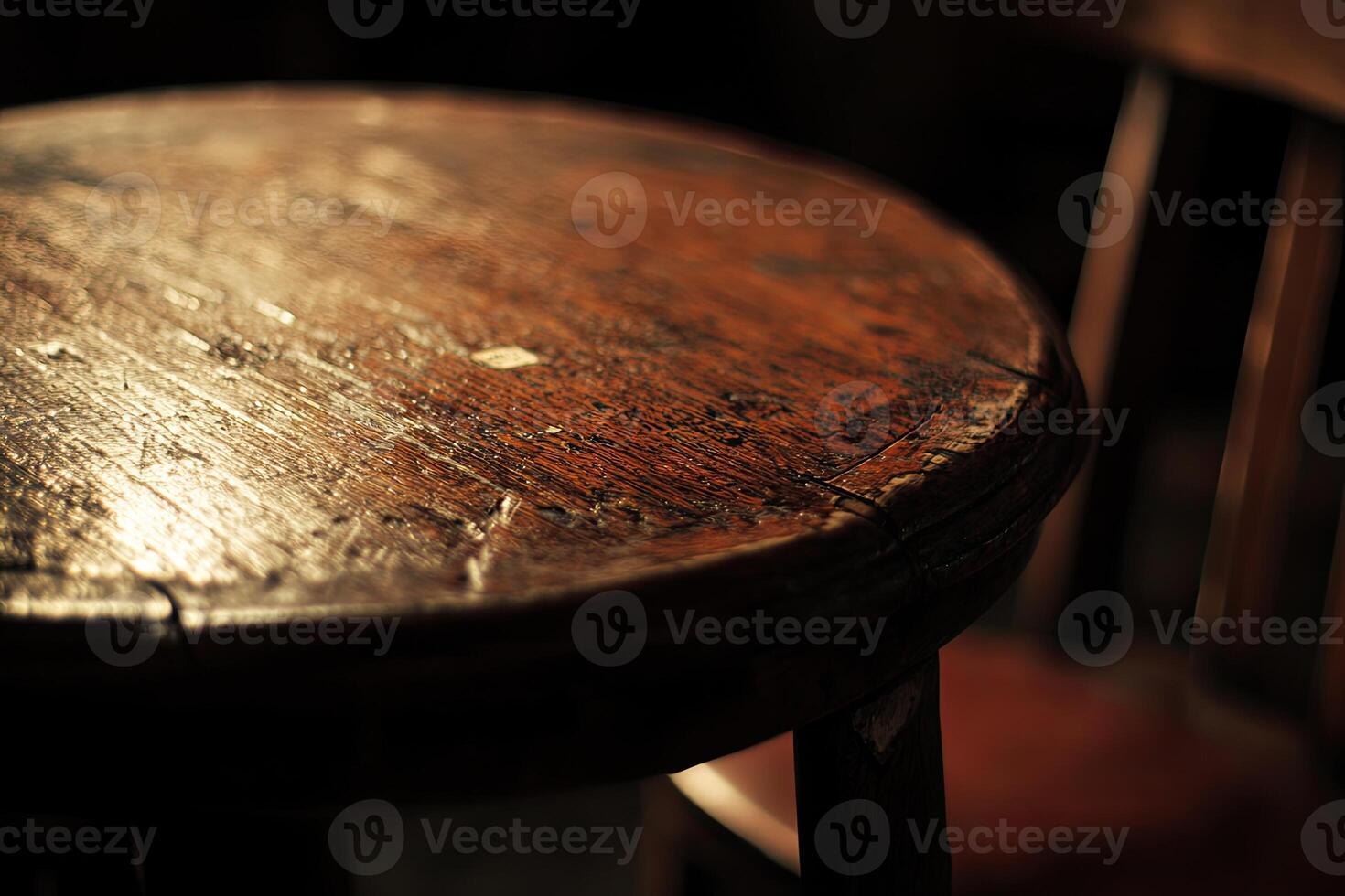 A wooden table with a chair photo