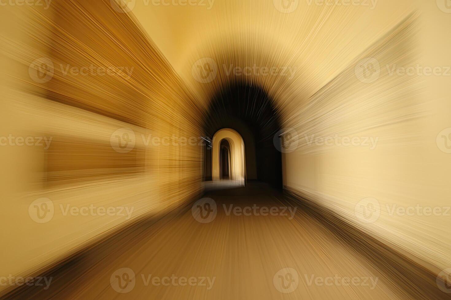 A blurry image of a tunnel with a light in the middle photo