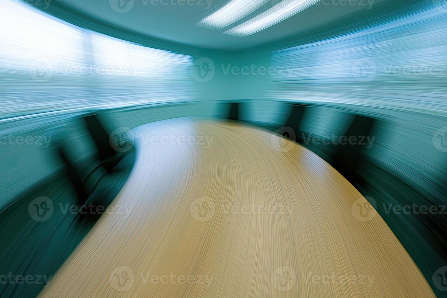 A blurry image of a conference table photo