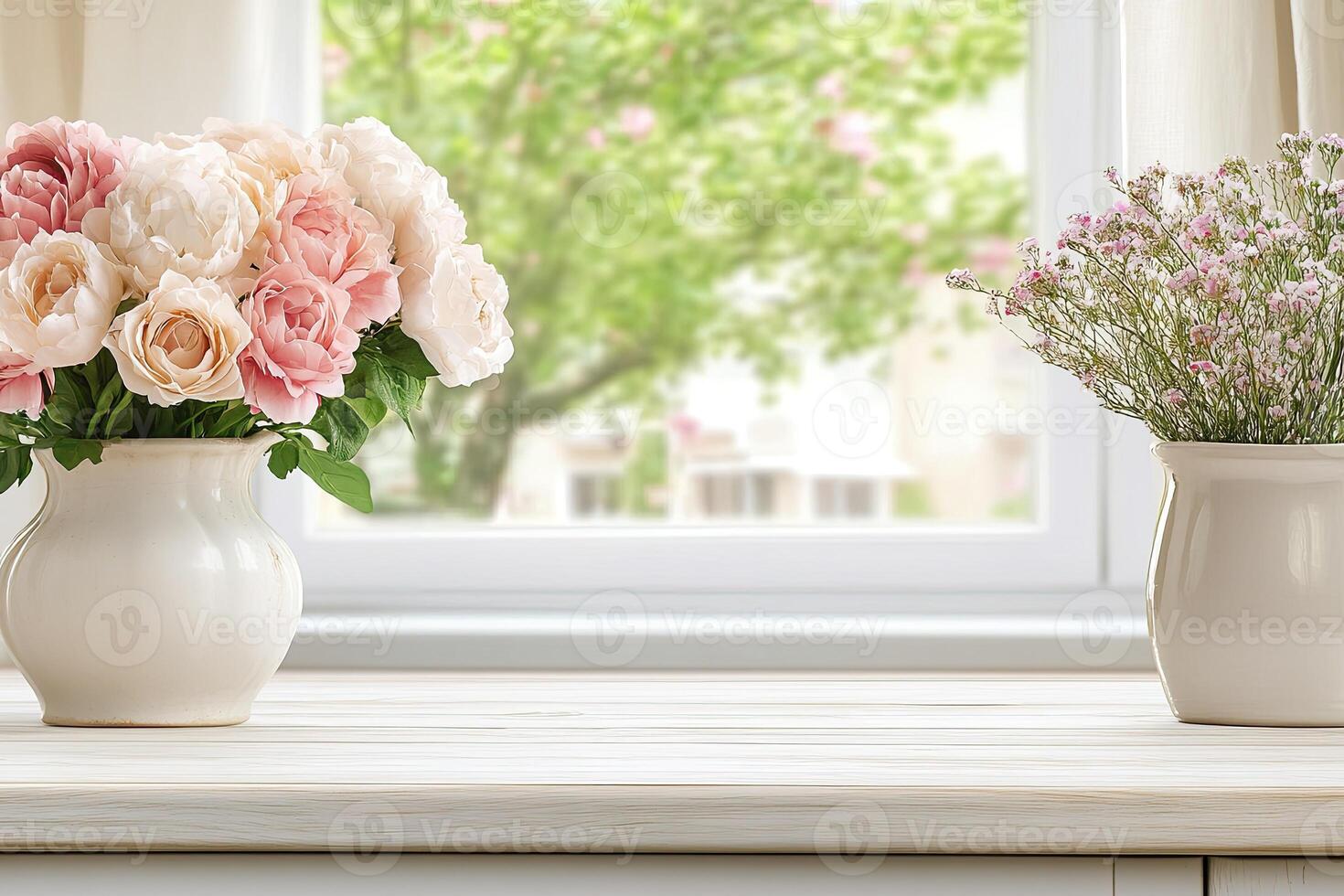 Two vases with pink flowers on a table photo