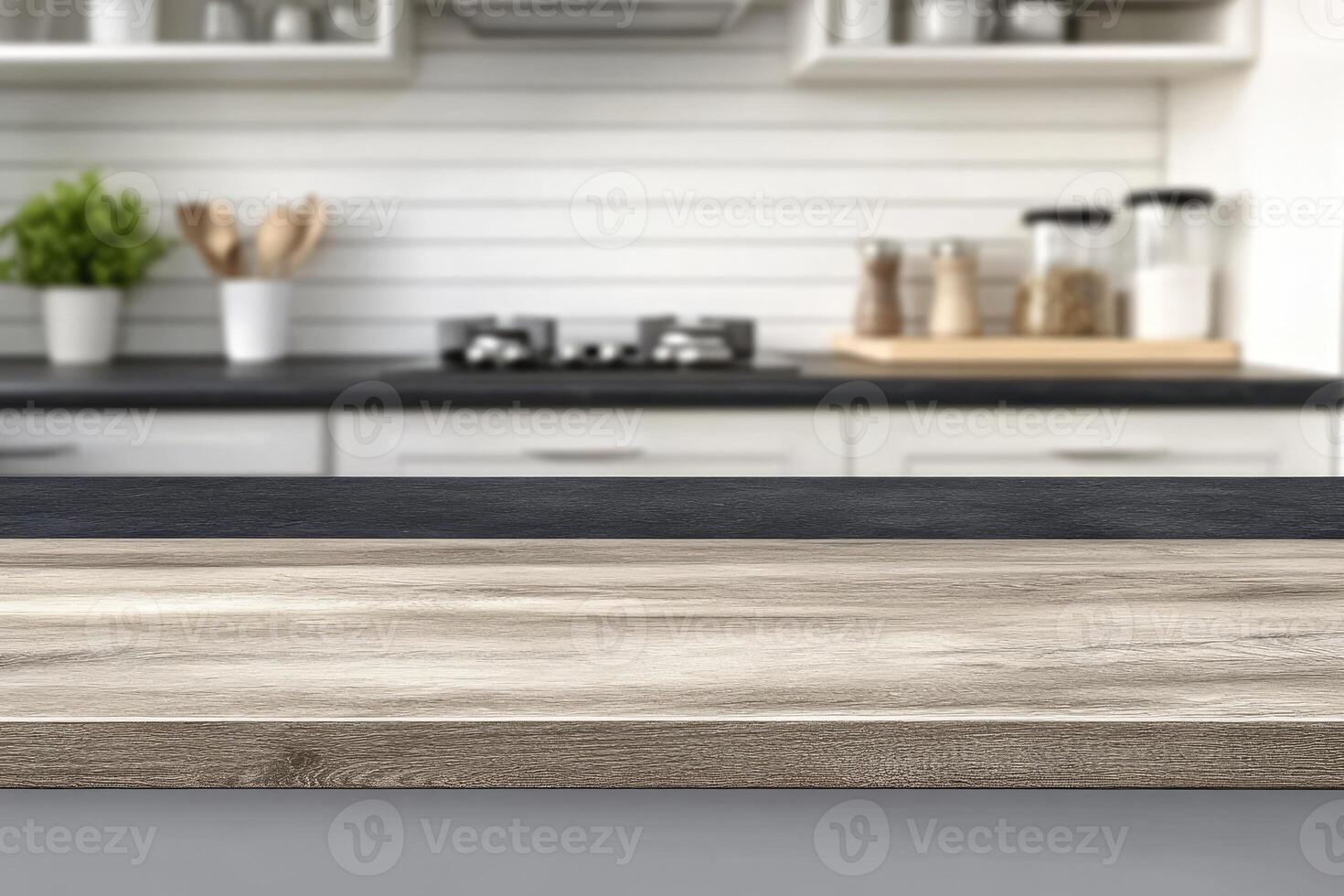A kitchen counter with a wooden top and black counter photo