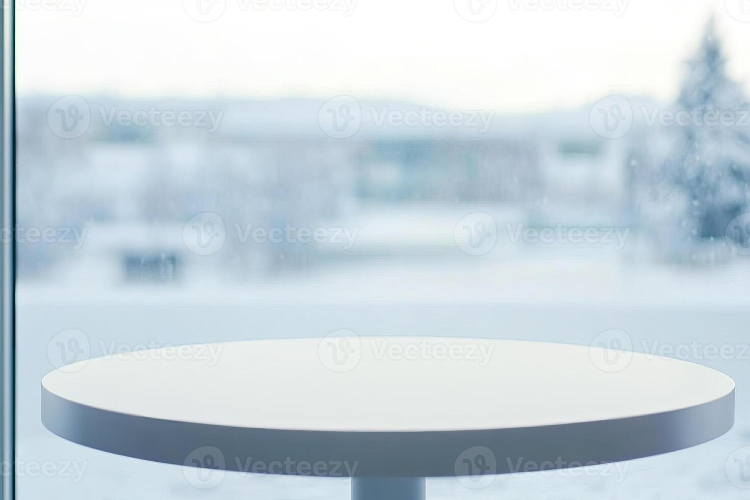 Table in the window with snow on the ground photo