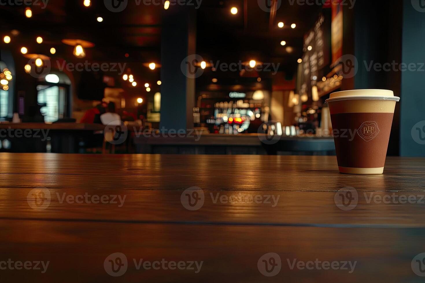 A coffee cup sitting on a table in a restaurant photo