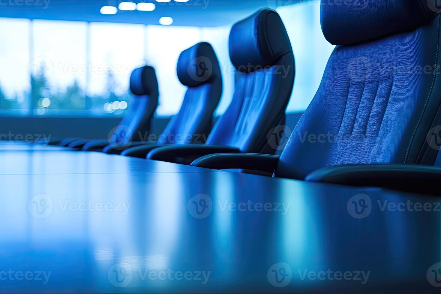 A long table with chairs in front of a window photo