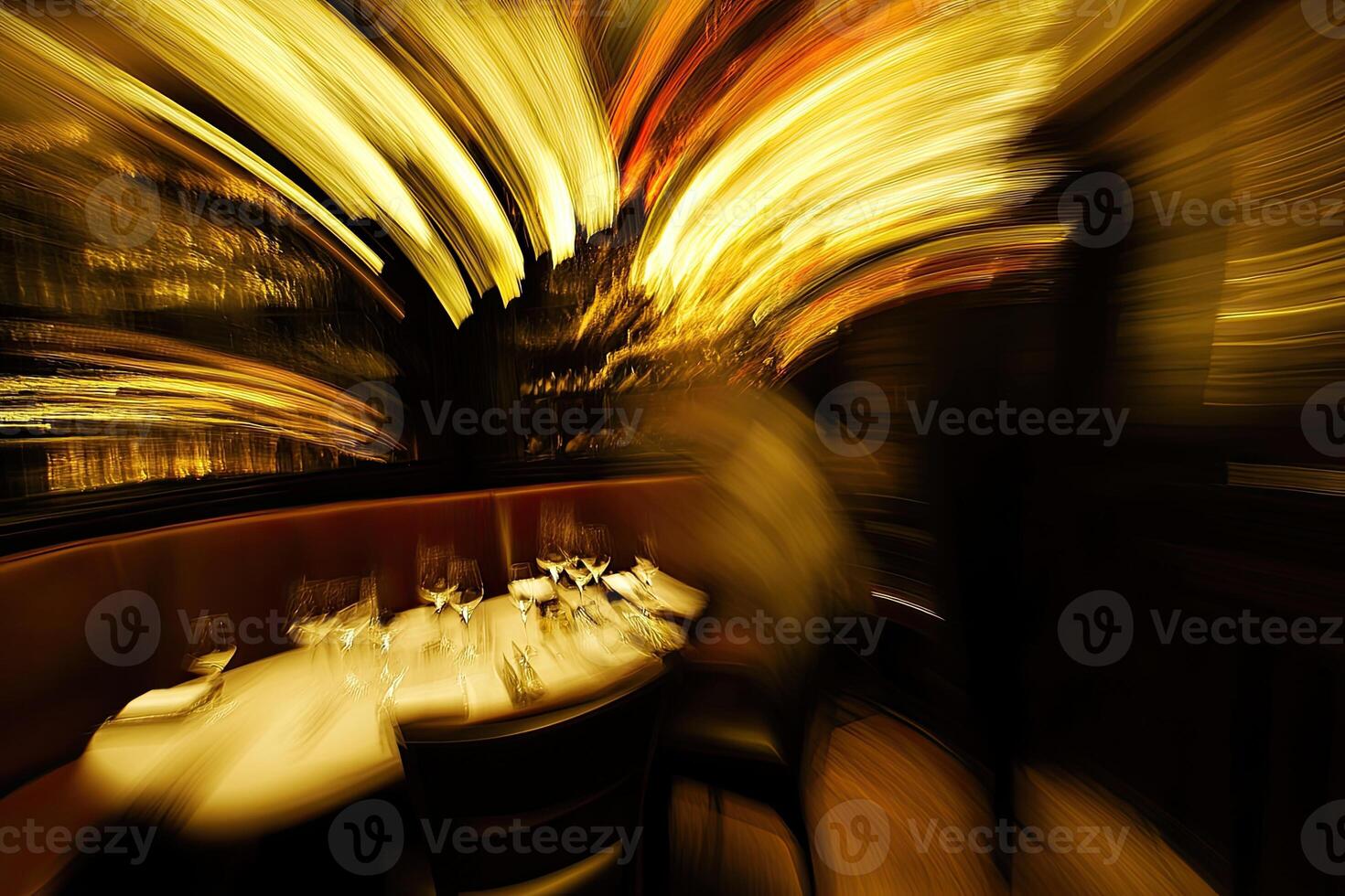 A blurry picture of a restaurant with a table and chairs photo