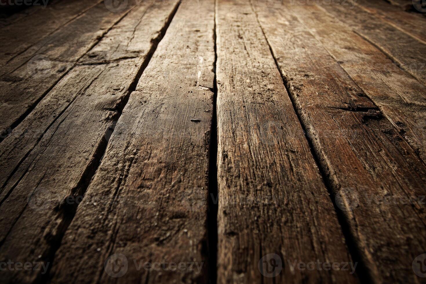 An old wooden floor with a light coming from the wall photo
