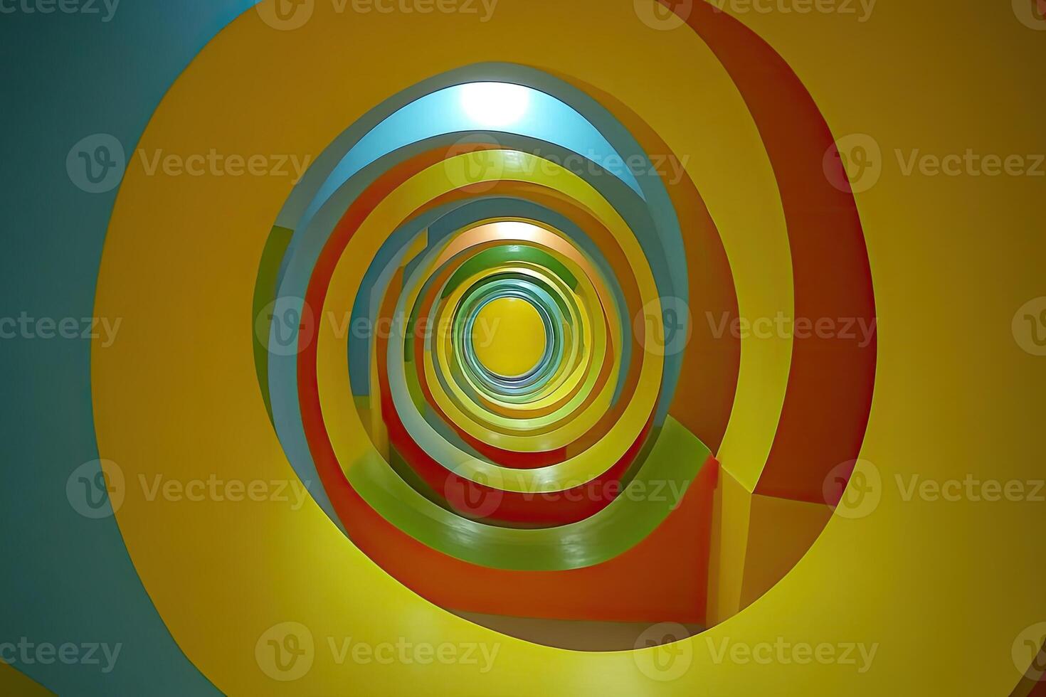 A colorful spiral shaped room with a light shining through it photo