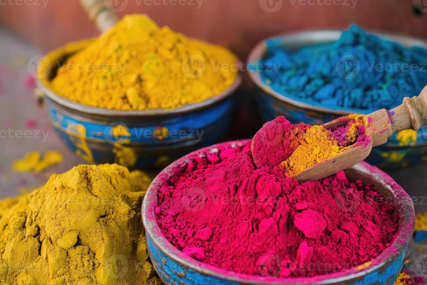 Colorful powders in bowls with wooden spoons photo