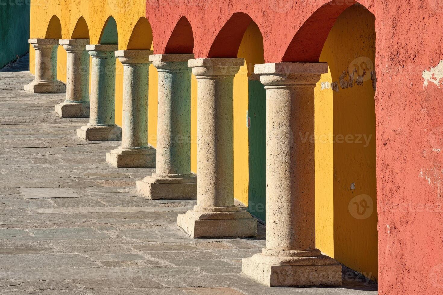 Colorful columns in a row of colorful buildings photo