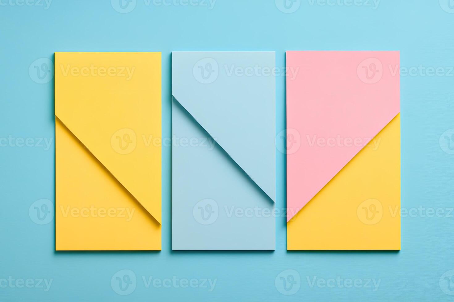 Four colorful paper pieces on a blue background photo