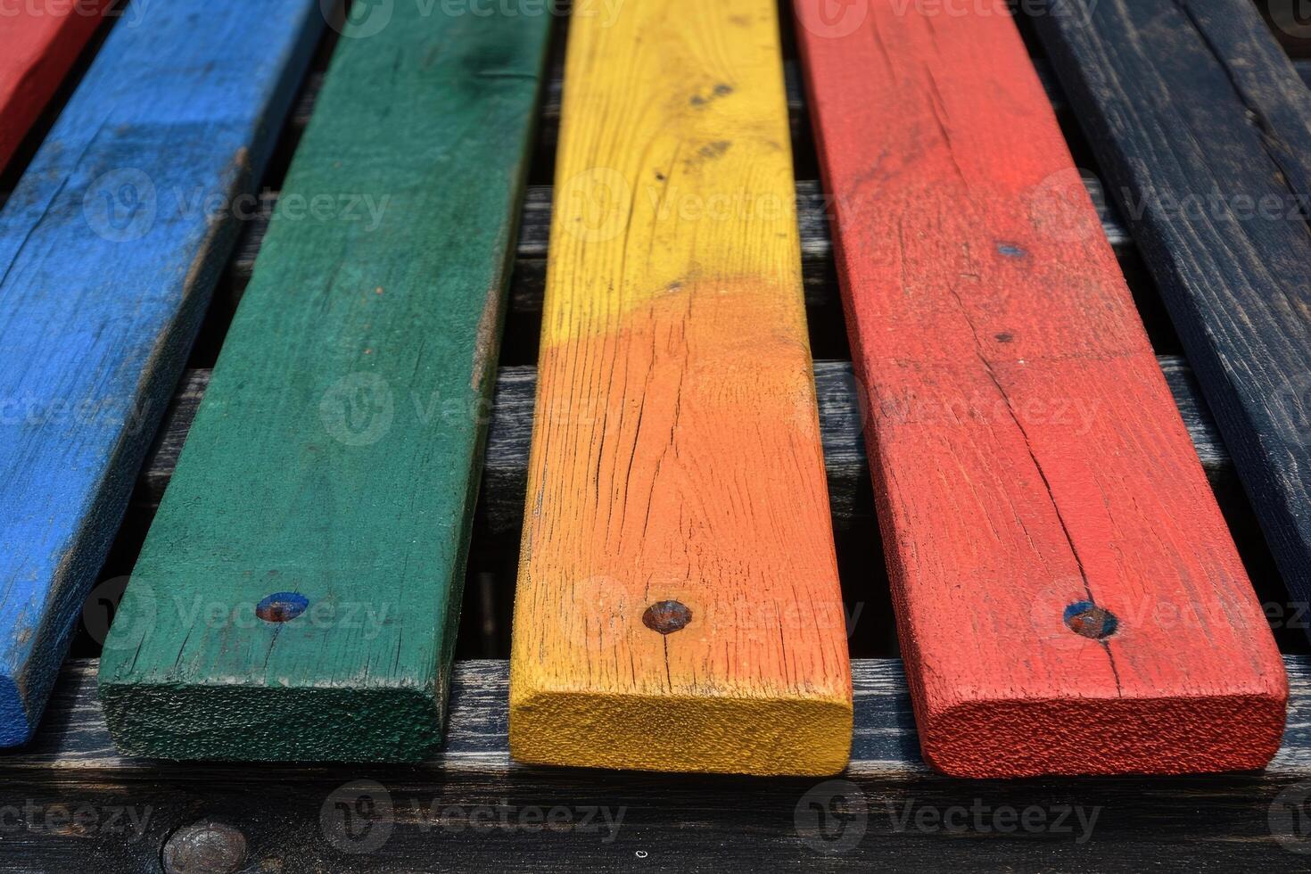 A close up of a row of colorful wooden planks photo