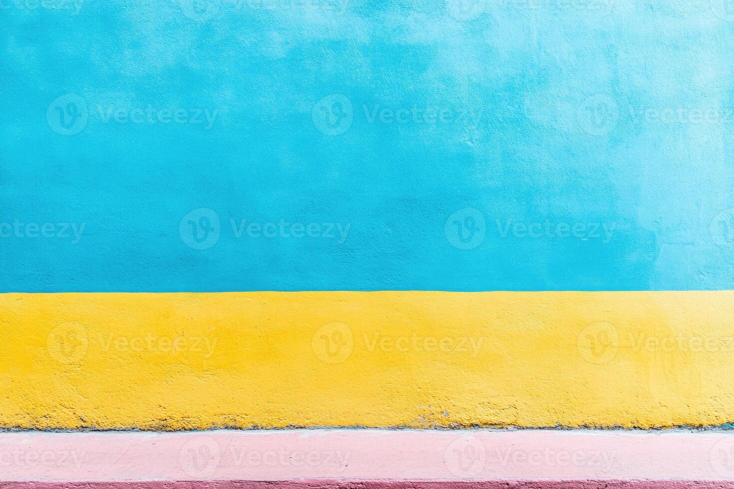 Colorful wall with blue, yellow and pink stripes photo