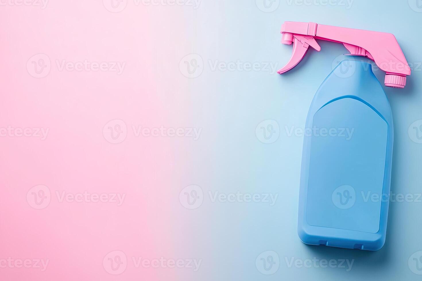 A blue spray bottle with pink sprayer on a pink and blue background photo