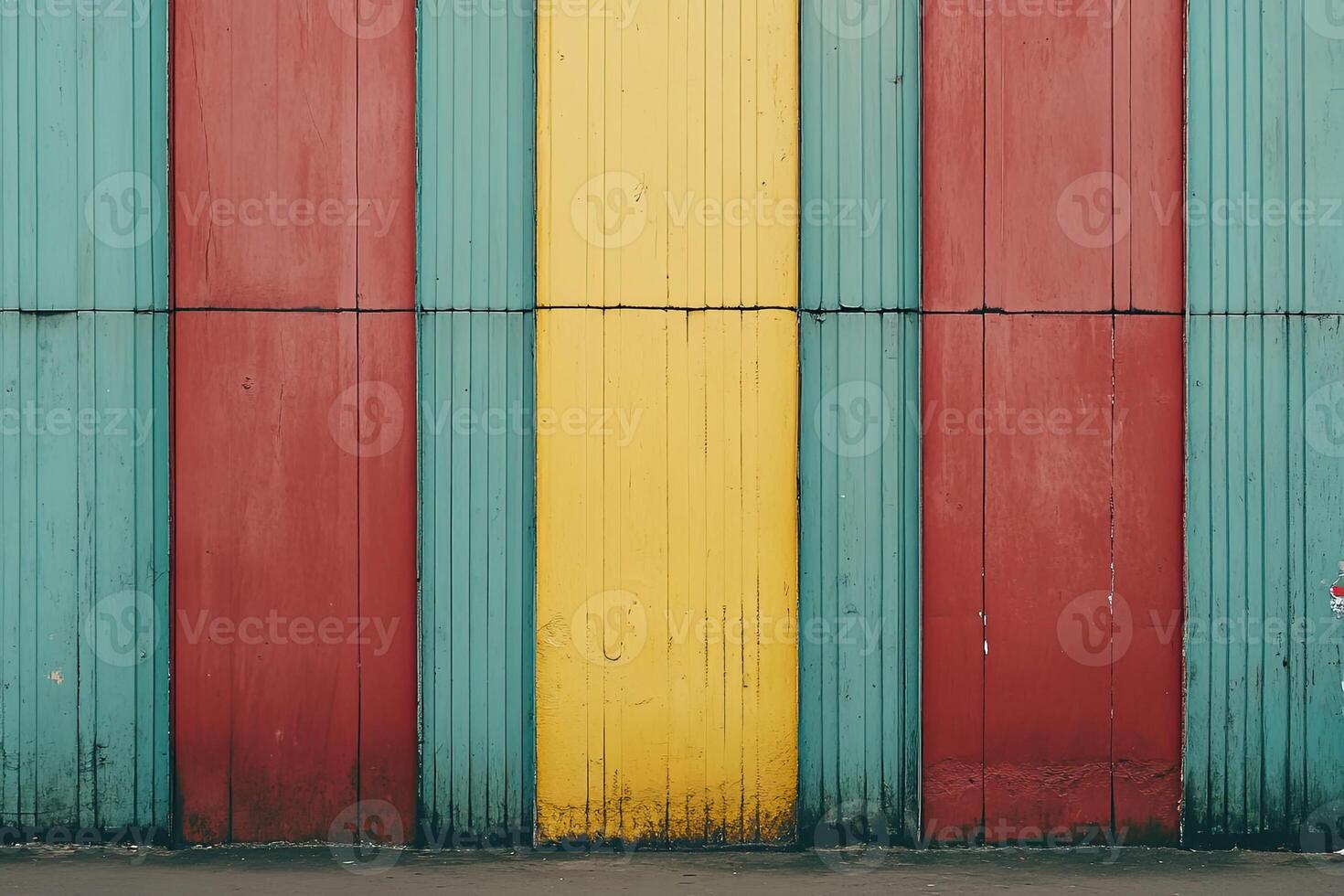 A man standing in front of a colorful wall photo