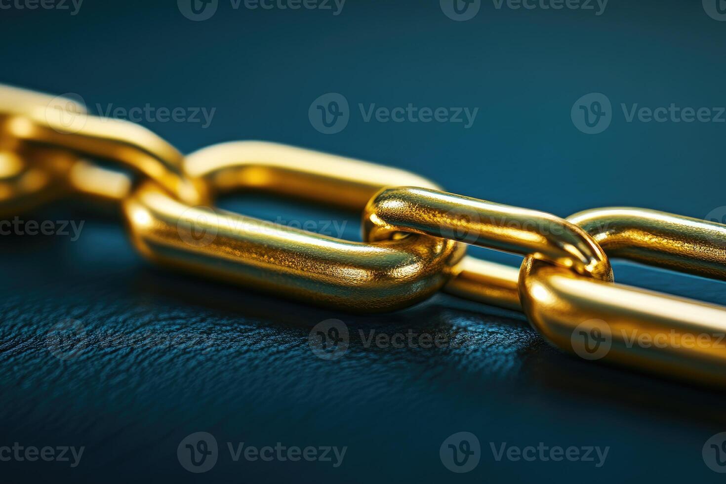 Close-up of golden chain links photo