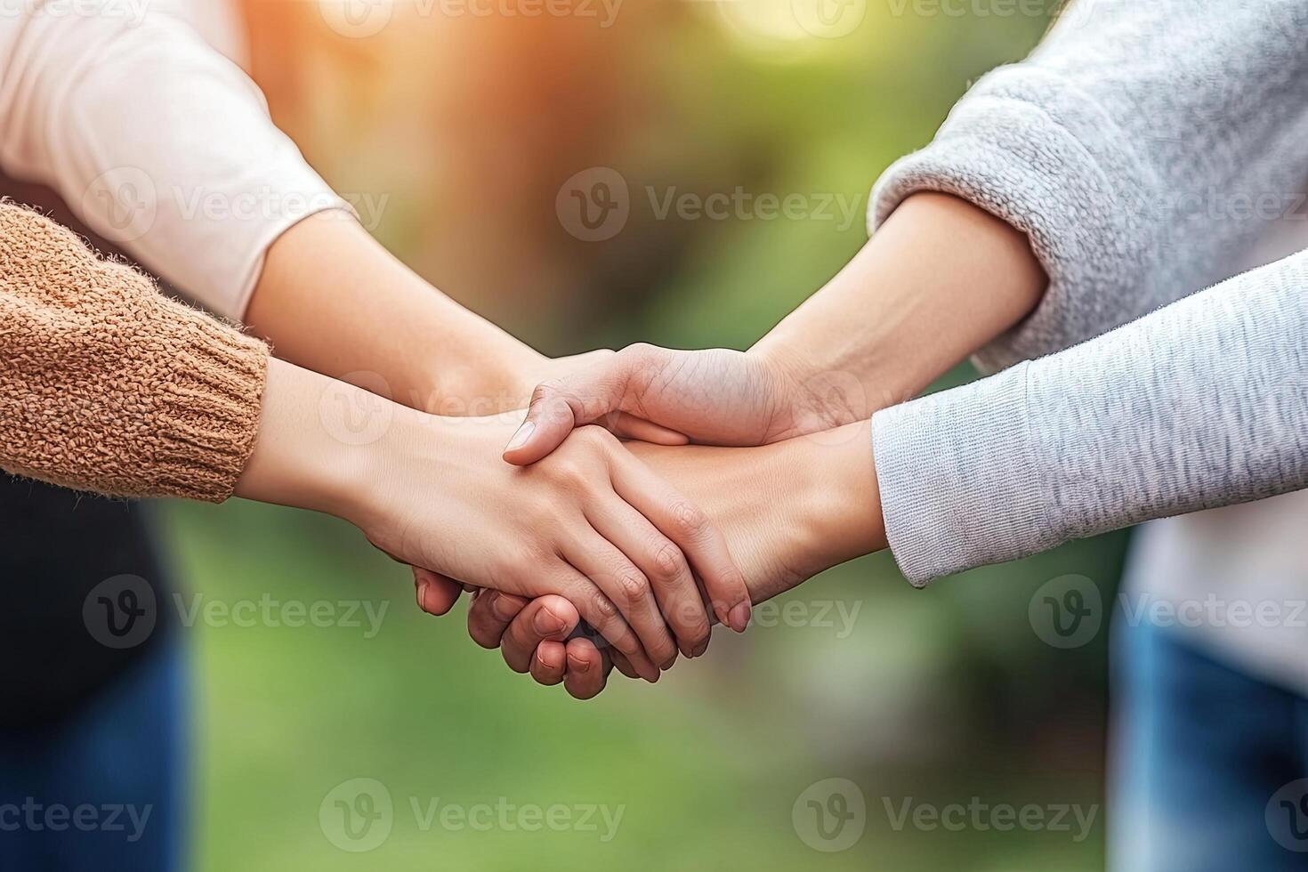 Hands clasped in unity, a symbol of friendship photo