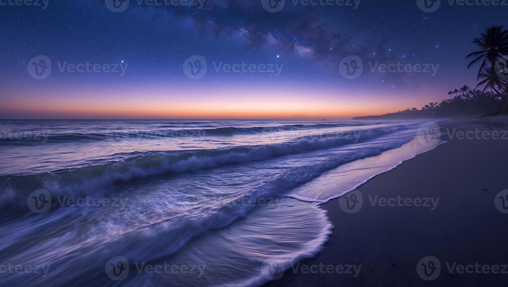 Serene Beach Waves at Twilight Under a Starry Night Sky photo