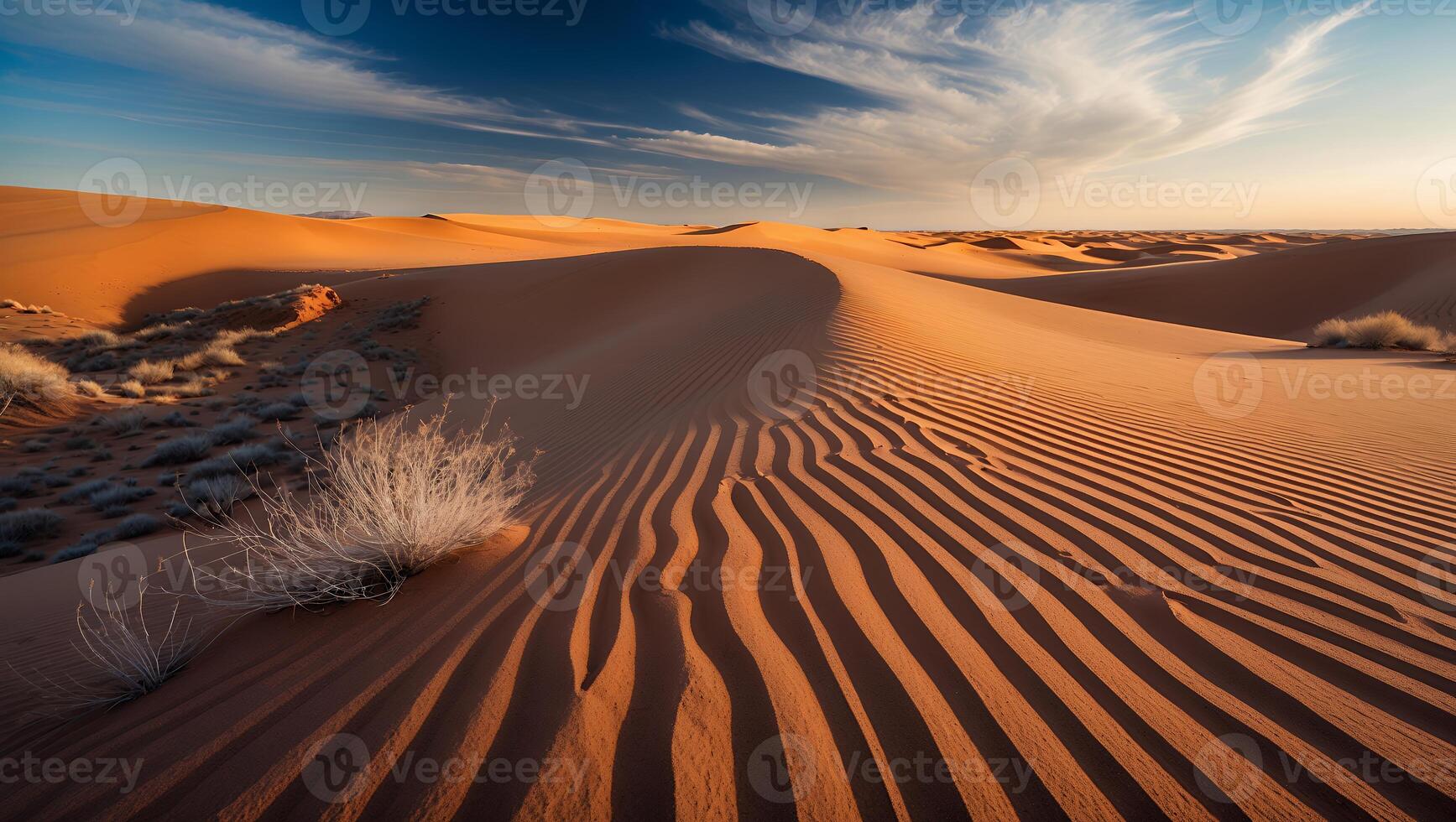 Rolling Sand Dunes at Sunrise with Clouds Creating Desert Landscape photo
