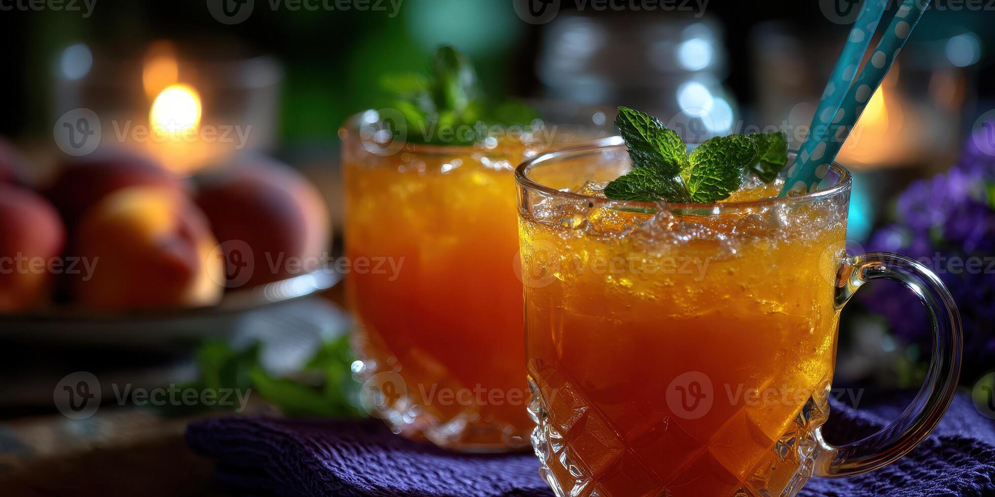 Refreshing iced tea served with mint and peaches in a cozy, dimly lit setting photo