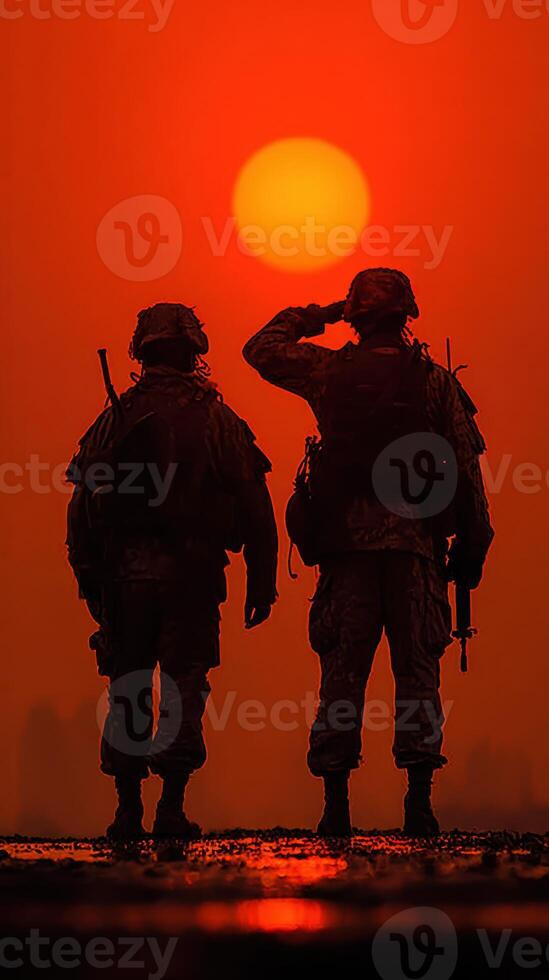 Soldiers salute at sunset during a military operation in a remote location photo