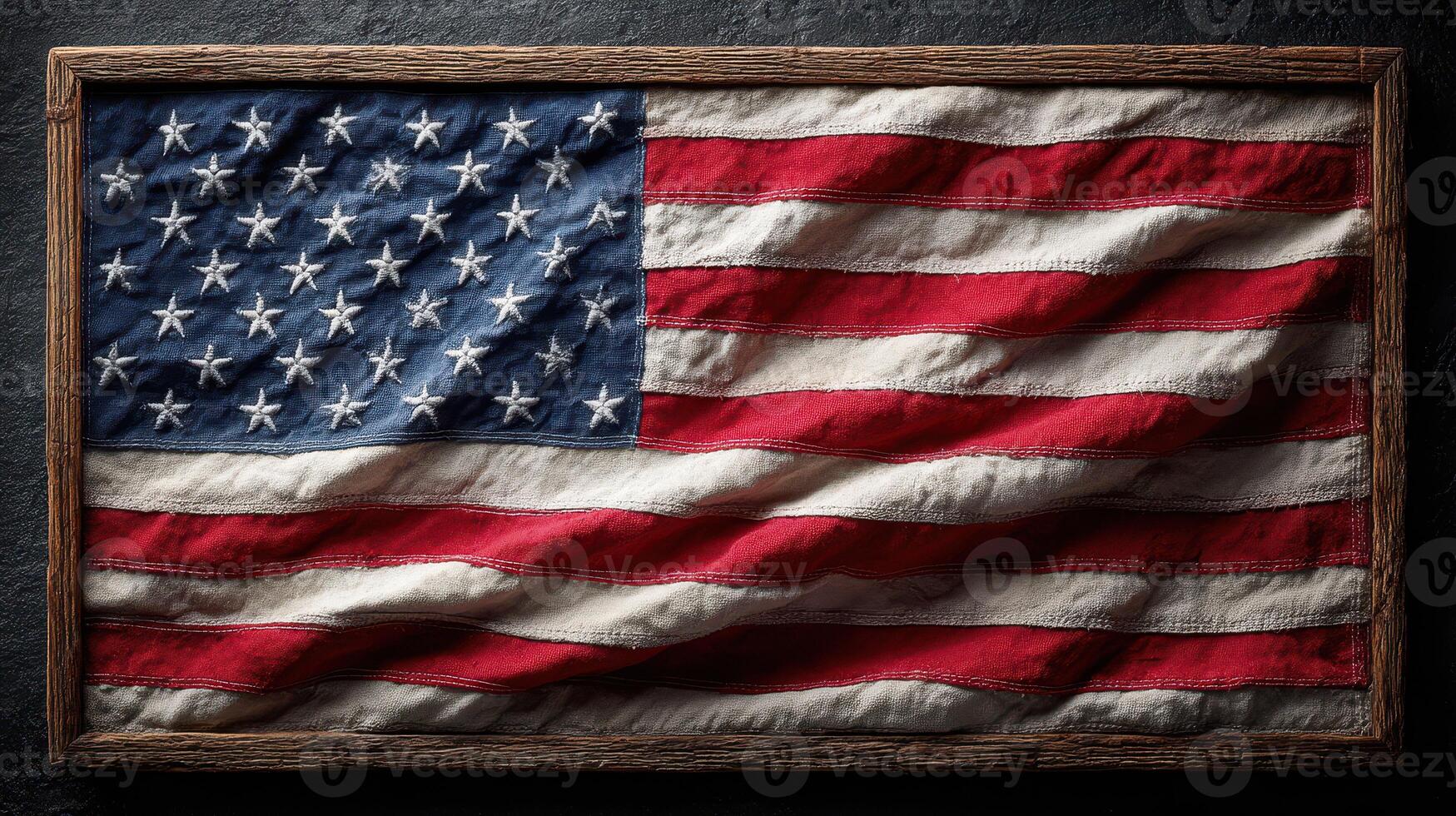 Textured American flag displayed in a rustic frame with gentle waves reflecting natural light photo