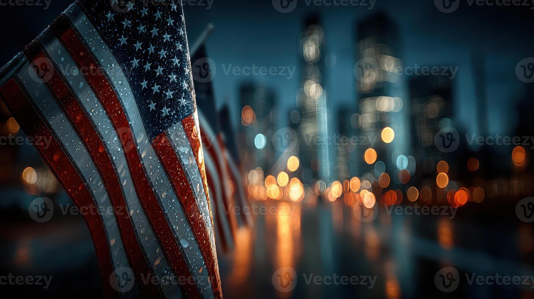 Flags flutter under city lights, showcasing patriotic spirit on a rainy evening in the urban landscape photo