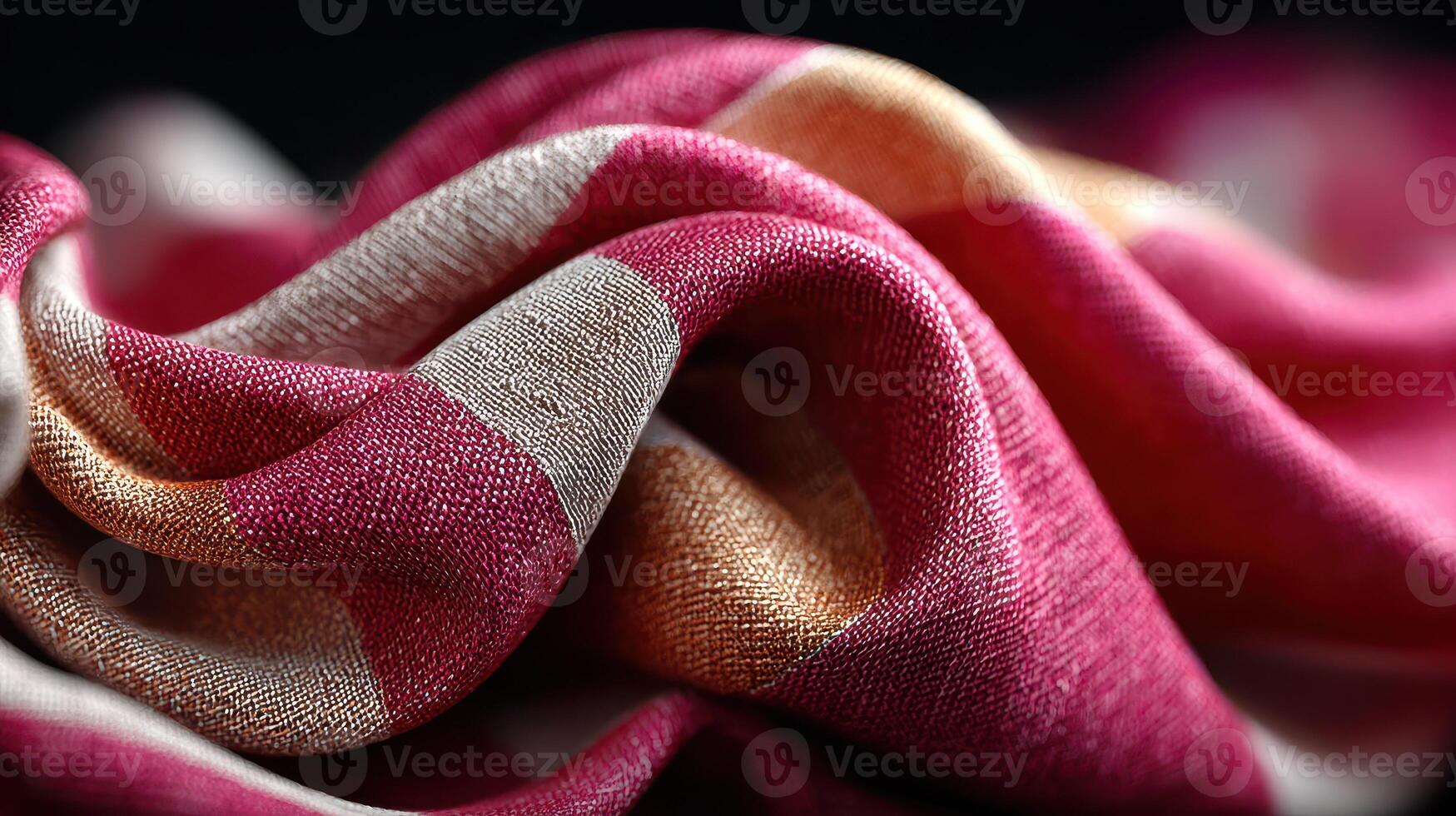 Textured fabric with vibrant colors folds and highlights captured in a close-up setting photo