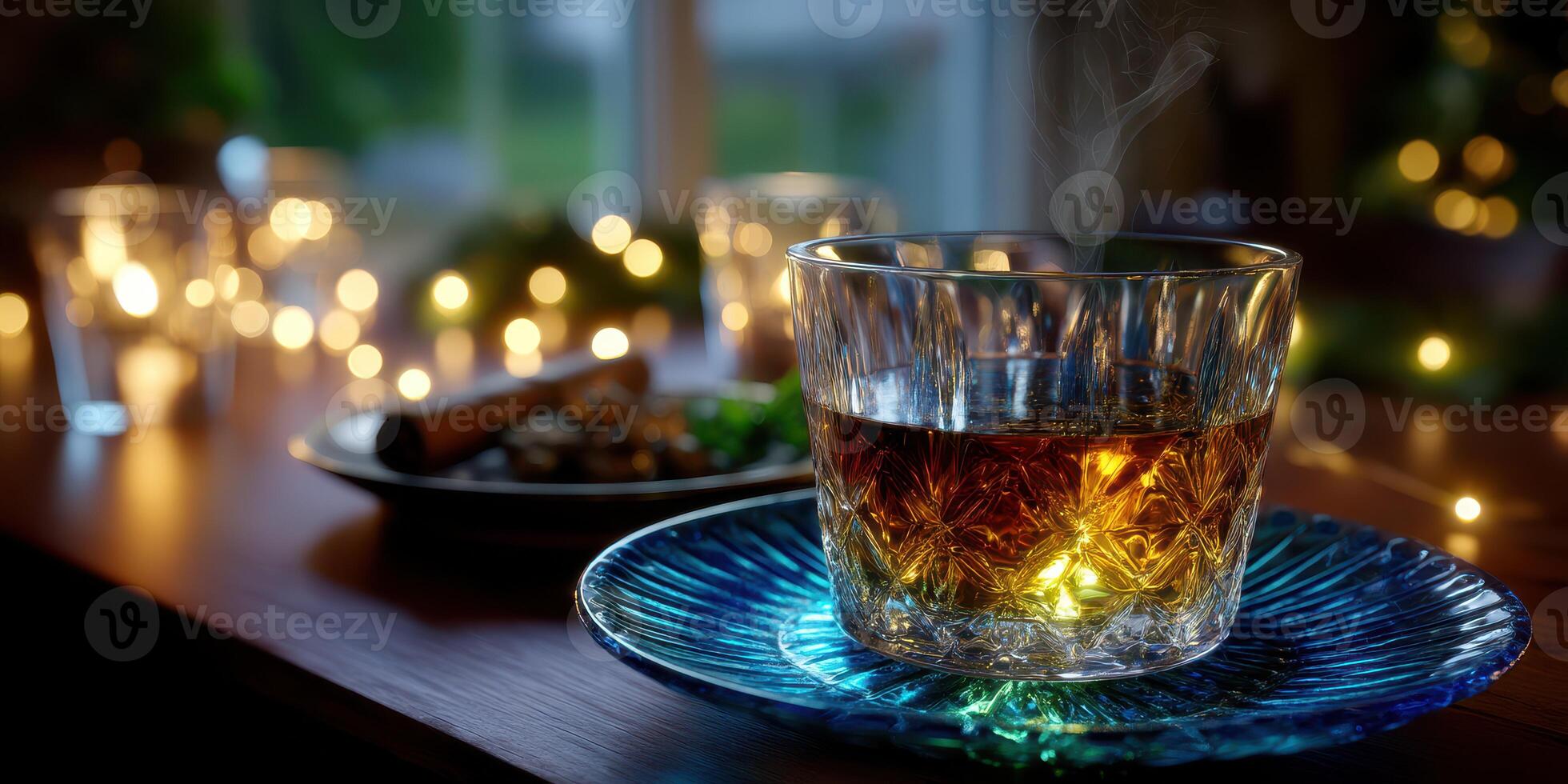 Warm drink on a cozy table with glowing lights and delicious snacks during an evening gathering photo