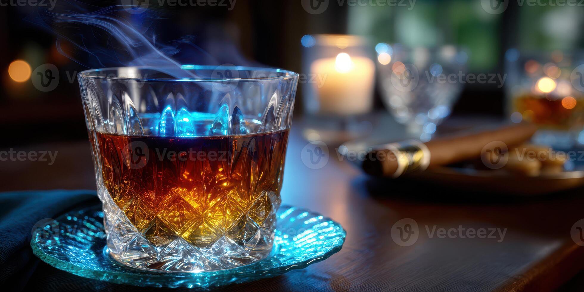 Relaxing evening with a glass of whiskey and cigar in a cozy setting by candlelight photo