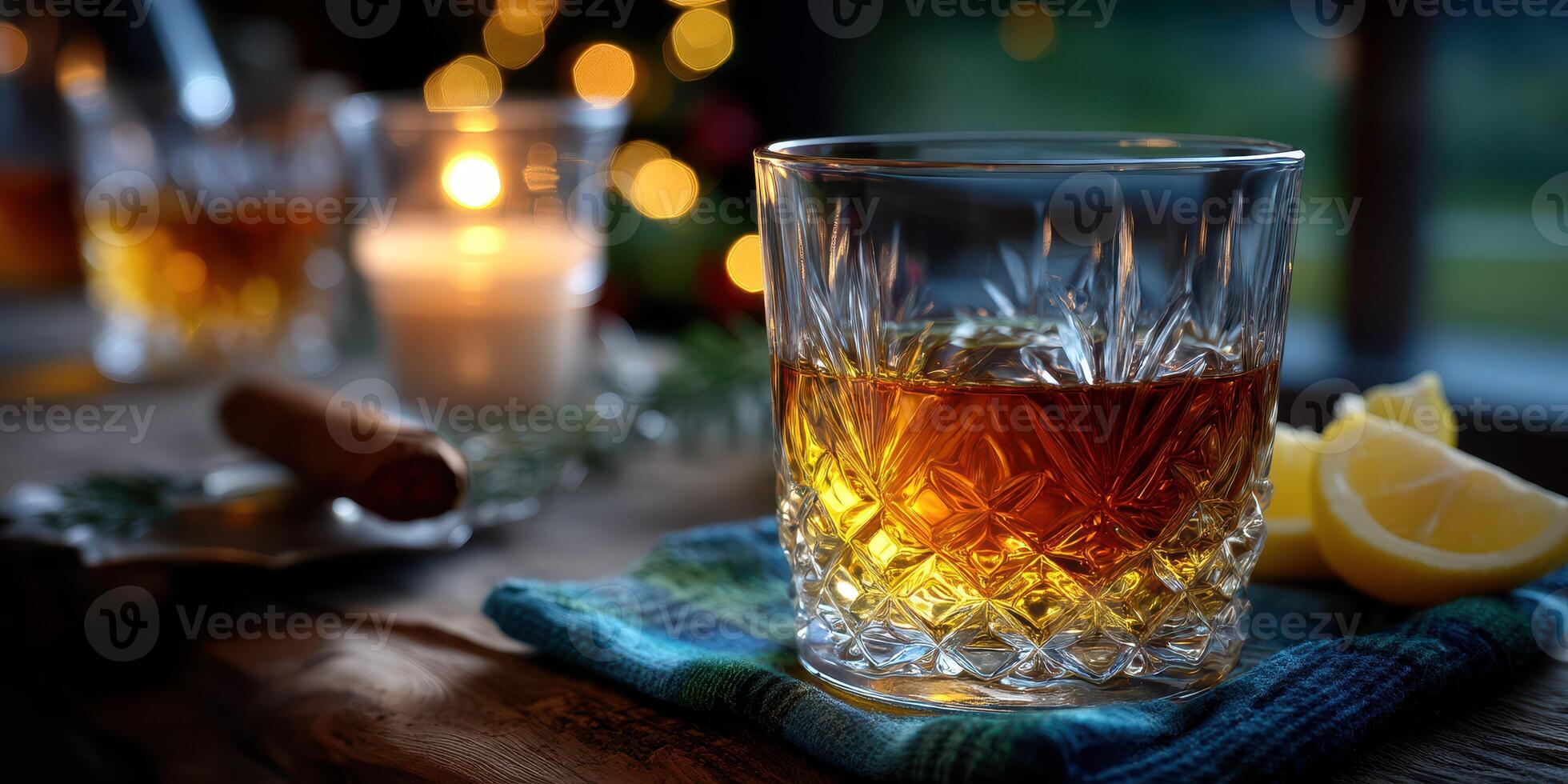 Warm evening gathering with whiskey, candlelight, and fresh lemon slices on a rustic wooden table photo
