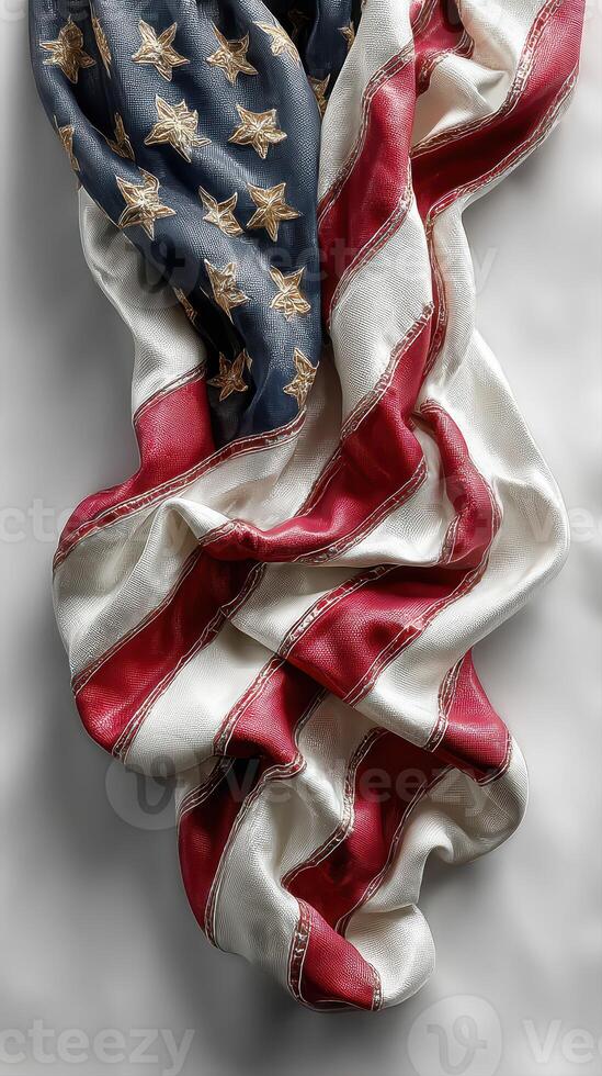 Elegant display of a folded American flag highlighting its detailed design and rich colors against a simple background photo