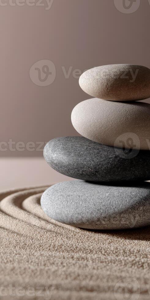 Stacked stones create harmony in minimalist zen garden setup photo