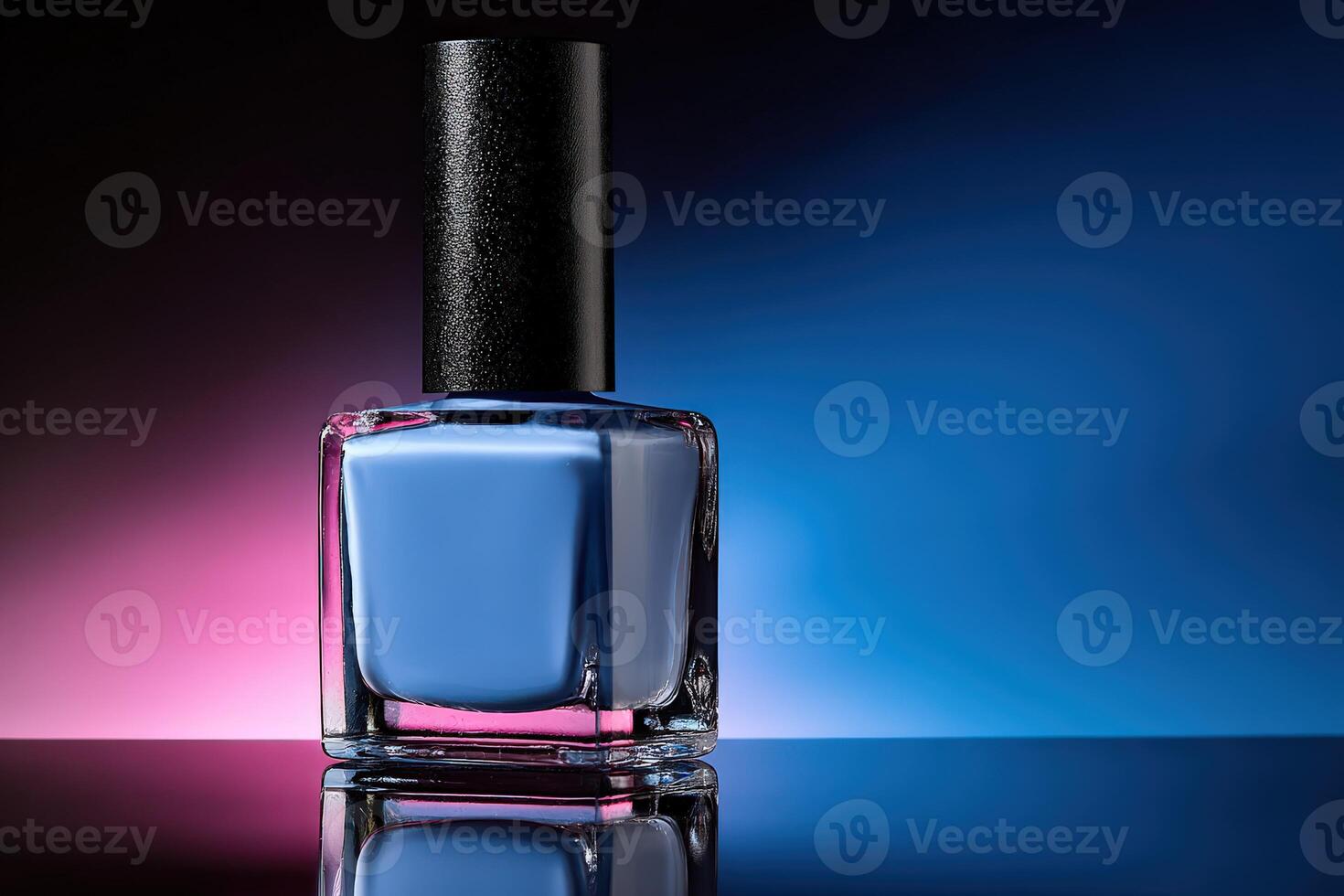 Vibrant blue nail polish bottle on reflective surface with colorful backdrop photo