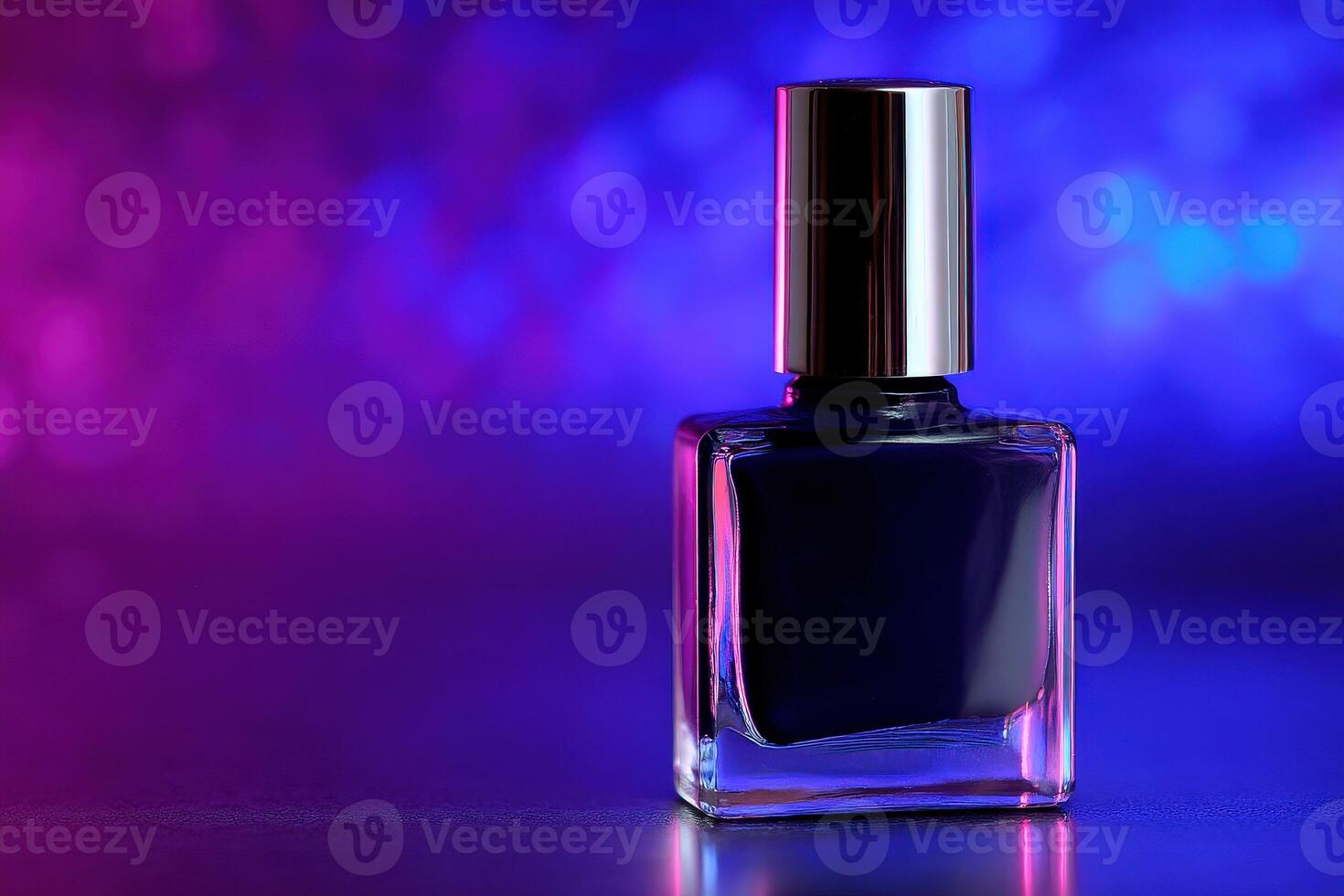 Dark blue nail polish bottle illuminated by colorful lights in a studio photo