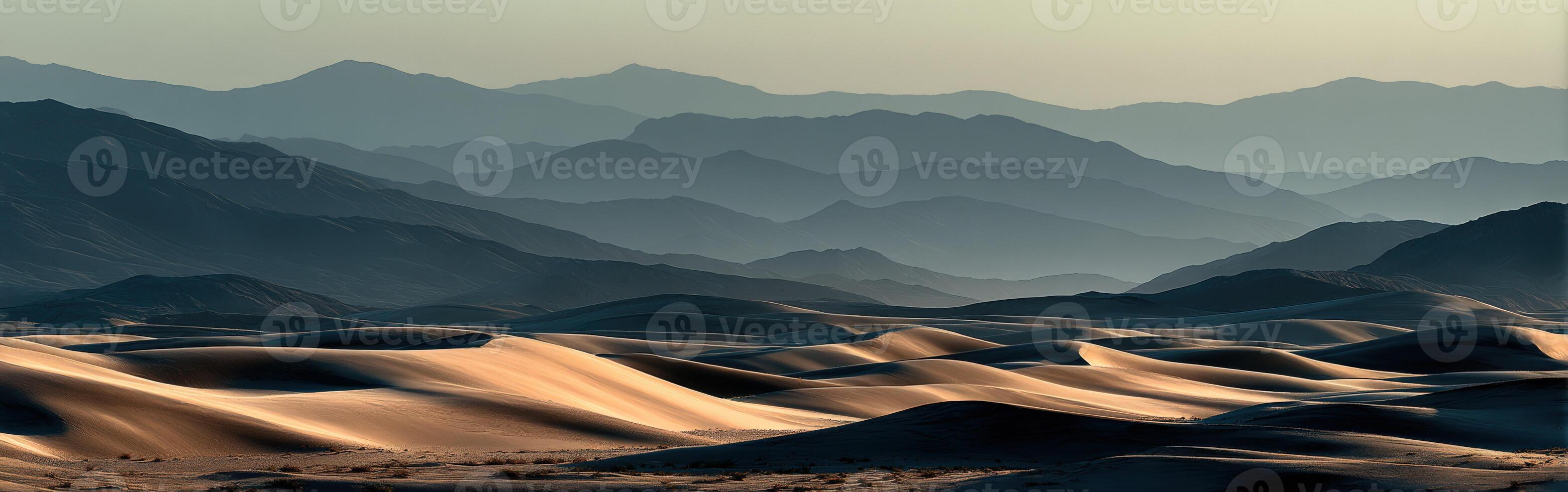 Mesquite flat sand dunes with mountain views in death valley photo