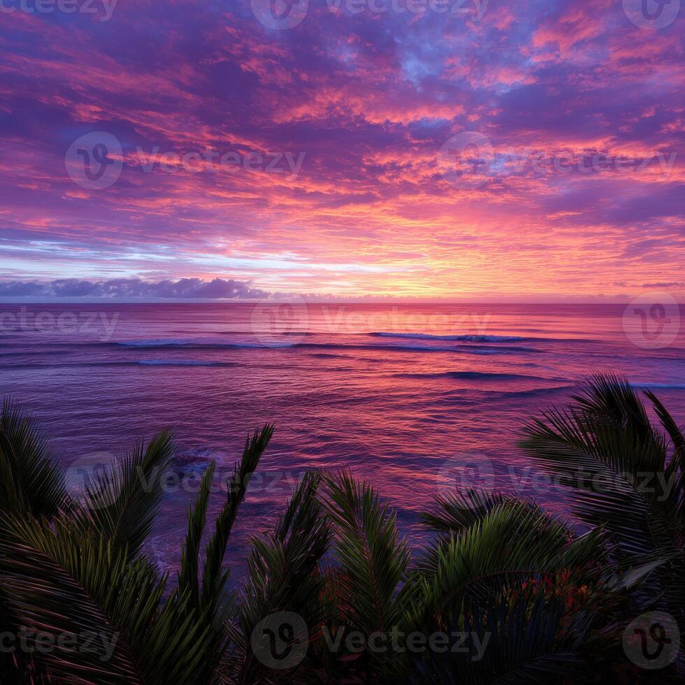 Stunning sunset over the calm ocean with vibrant purple and pink hues photo