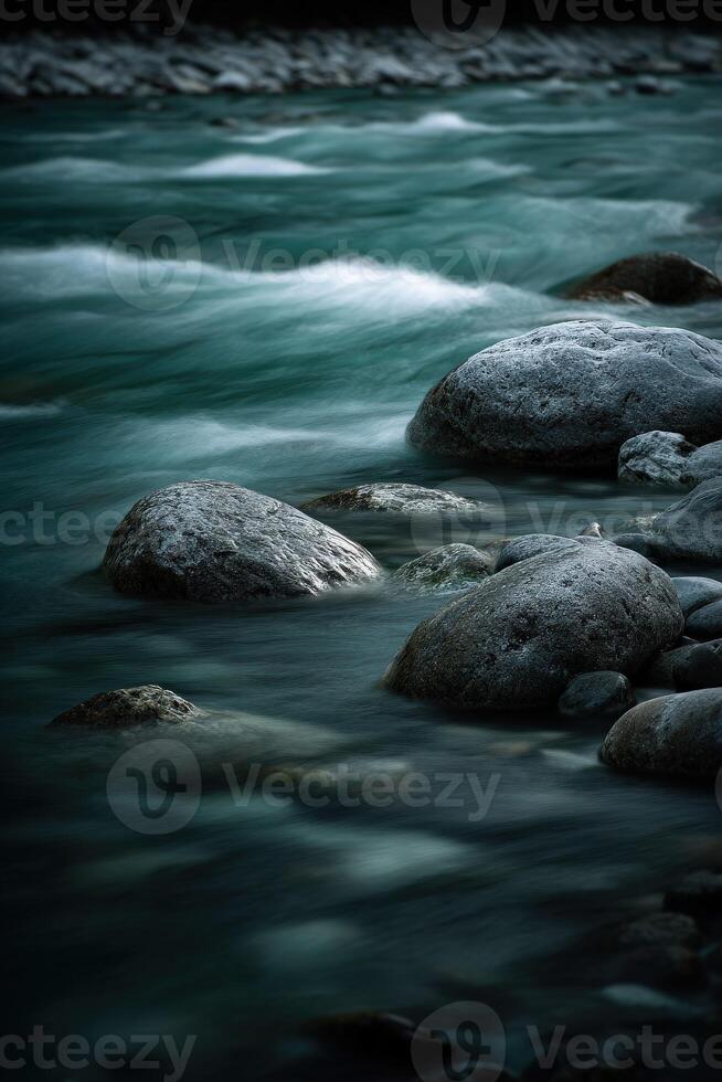 River runs through rocks, long exposure on a winter day photo