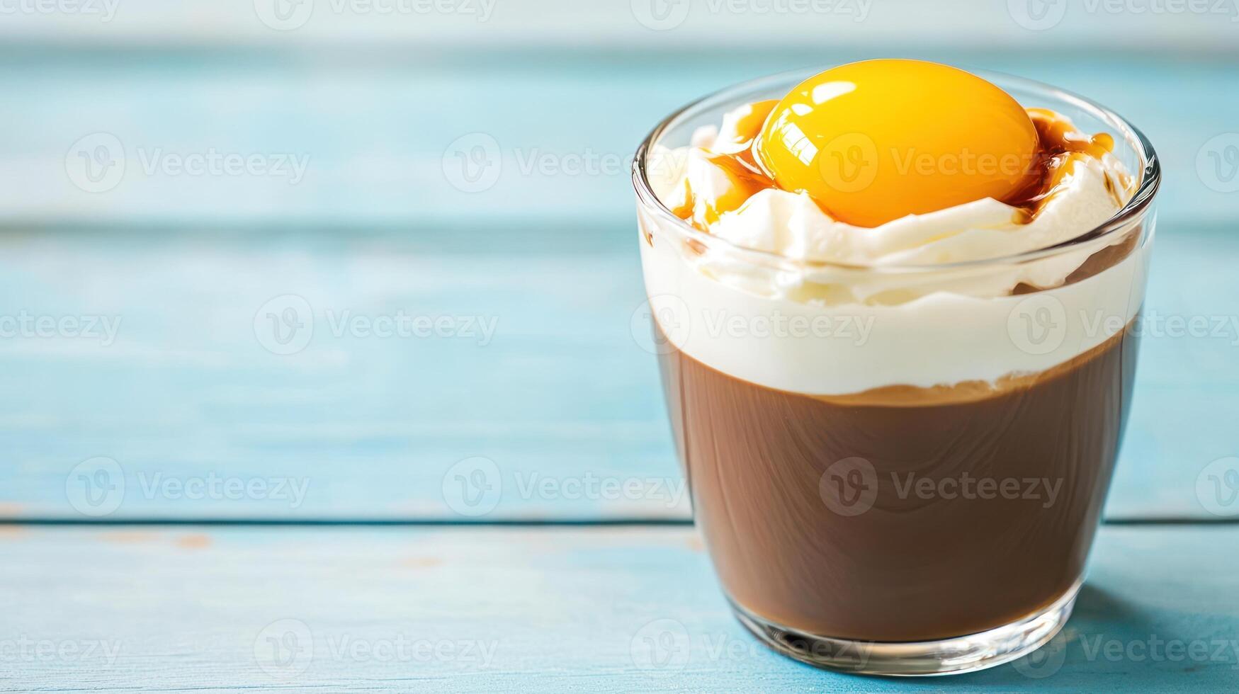 Chocolate pudding in glass with whipped cream and orange fruit, dessert concept on wood background photo