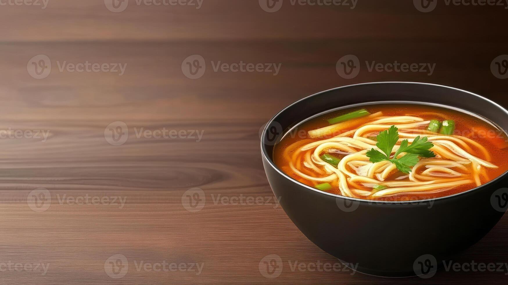 Noodles in bowl on wood table. Simple soup dish, garnish, healthy eating, background texture, close-up photo