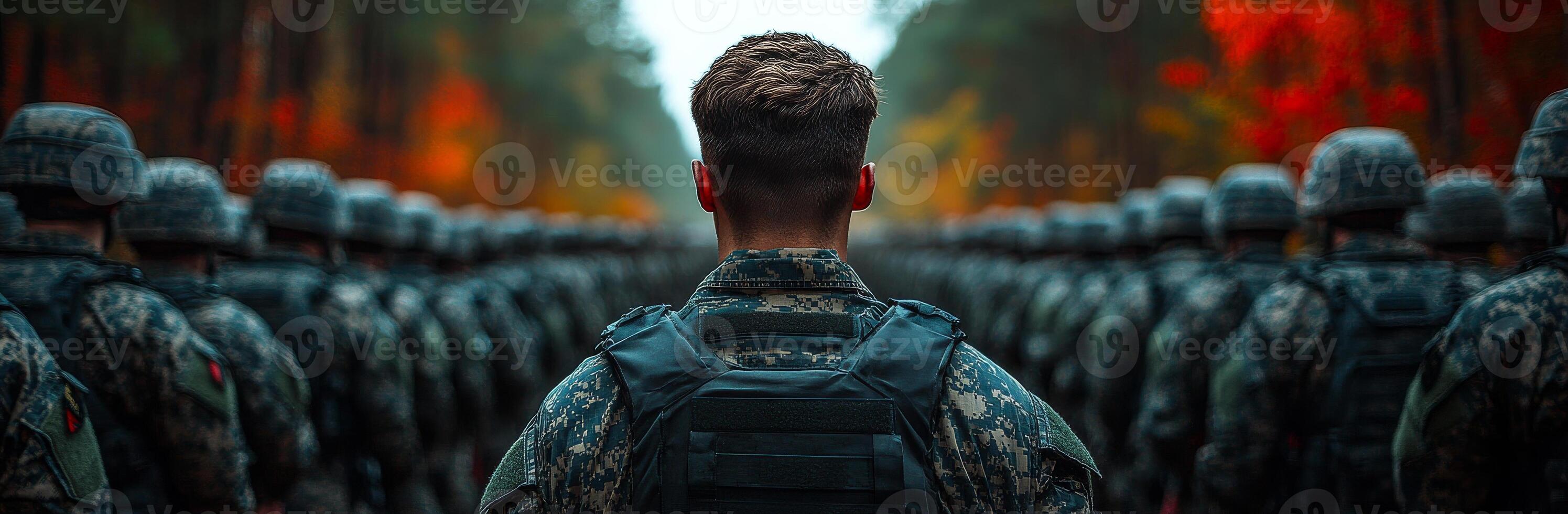 Soldiers in formation ready for training. Soldiers stand in formation by autumn trees, ready for a drill under overcast skies. photo