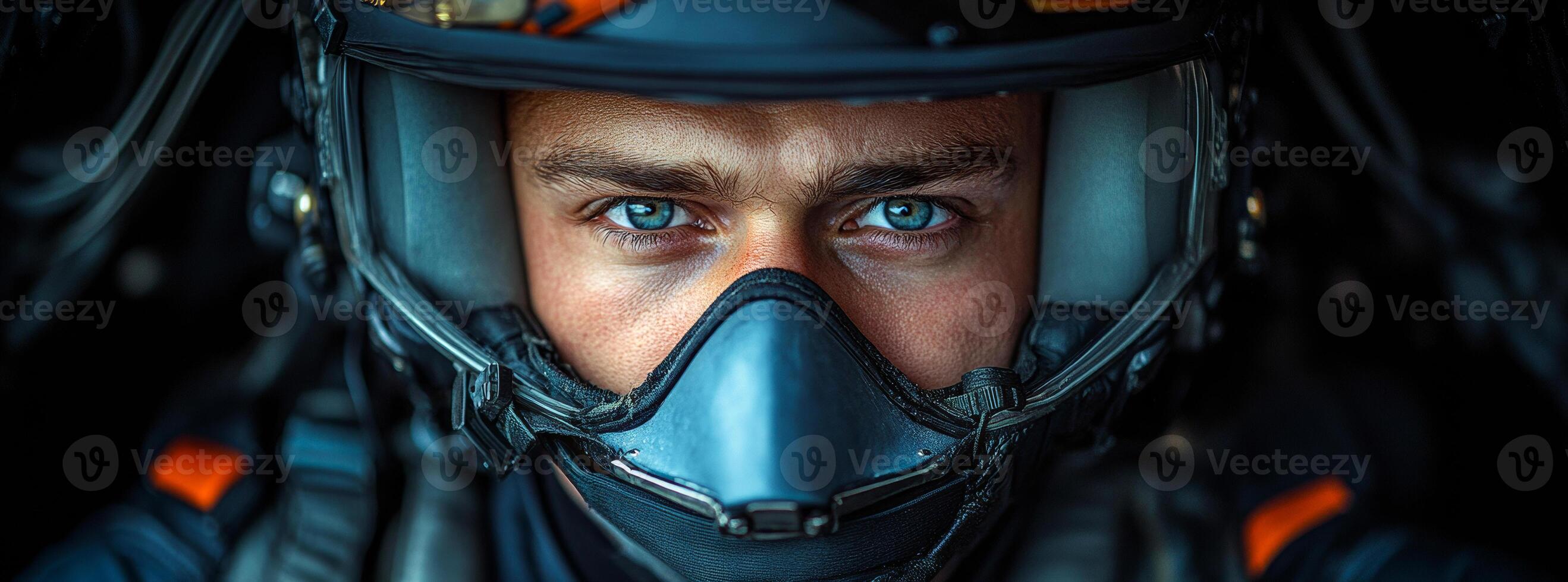 Pilot readying in cockpit. A focused pilot with striking blue eyes is in the cockpit, ready for an intense military flight mission. photo