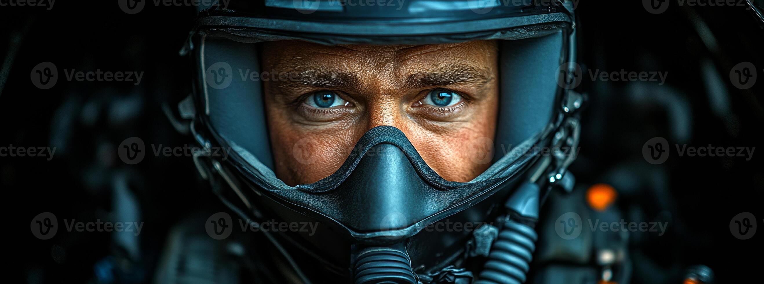 Pilot prepares for mission in cockpit. A focused pilot in a helmet and goggles awaits instructions inside the cockpit, emphasizing determination and readiness. photo