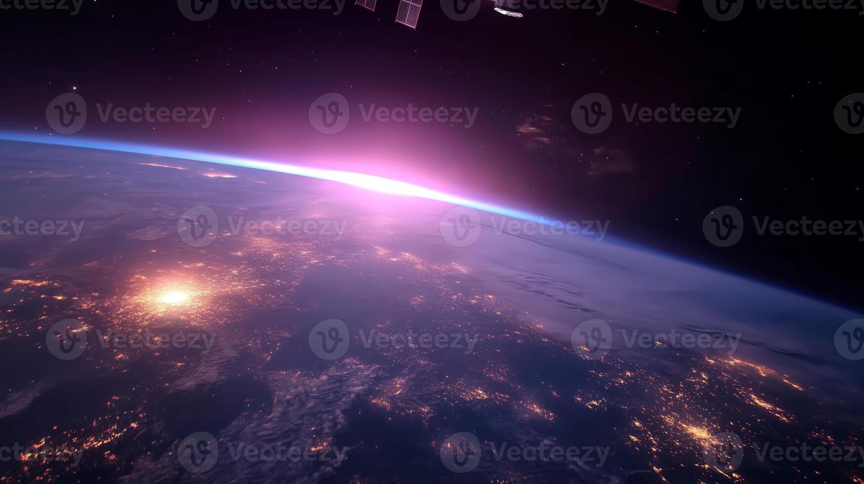Bright sunrise over Earth seen from space showcasing vibrant colors above the horizon photo
