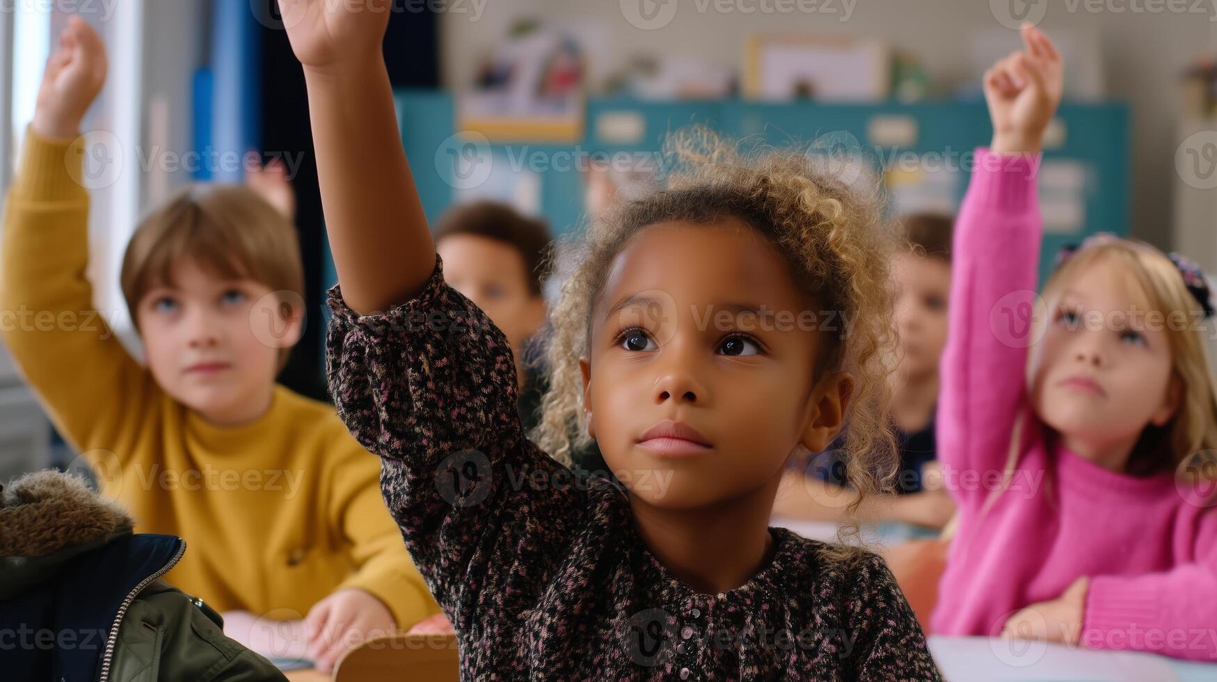 Students eagerly raise their hands to participate in a lively classroom discussion in an engaging learning environment photo