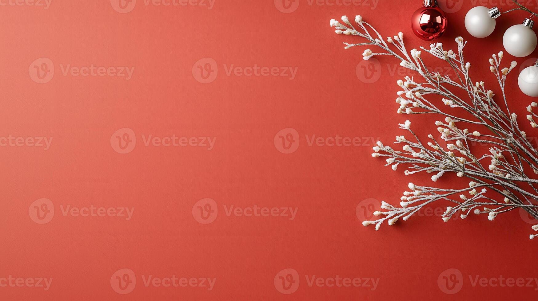 Holiday themed arrangement featuring red and white christmas ornaments and frosted branches on a vibrant red background, evoking seasonal cheer photo